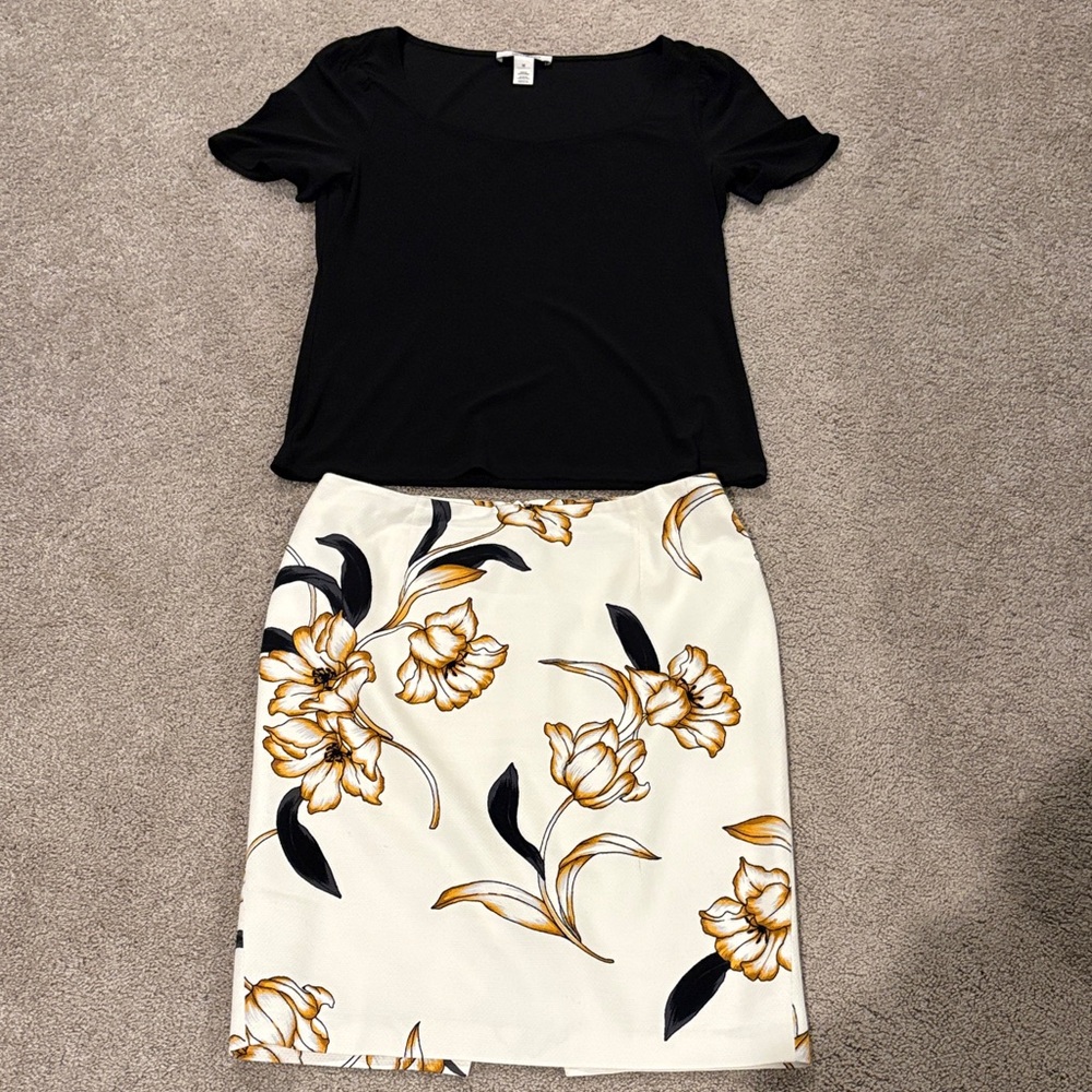White House Black Market Floral Skirt. Size 2. Black short sleeve boat neck top.